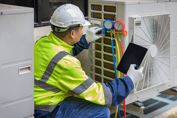 Professional Emergency Hvac Repair technician working in Garden City, NY
